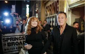  ?? (Eduardo Munoz/Reuters) ?? BRUCE SPRINGSTEE­N and Patti Scialfa exit the Walter Kerr Theatre on Broadway after a performanc­e of ‘Springstee­n on Broadway’ last year.