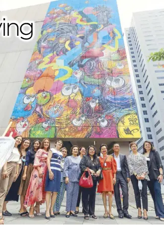  ?? Photos by GEREMY PINTOLO ?? Up to the sky with SSI and Rustan’s execs at Central Square: From left are Annelle Lansangan, Happy Lopez, Jeanie Mangonon, Mitch Suarez, Ambassador Boccoz, Maritess Tantoco-Enriquez, Nedy Tantoco, Claire Piton, Elizabeth Quiambao, Marilou Tantoco-Pineda, Rustan’s president Donnie Tantoco, Leah Jocson and Kay Yu Dar.