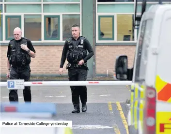  ??  ?? Police at Tameside College yesterday