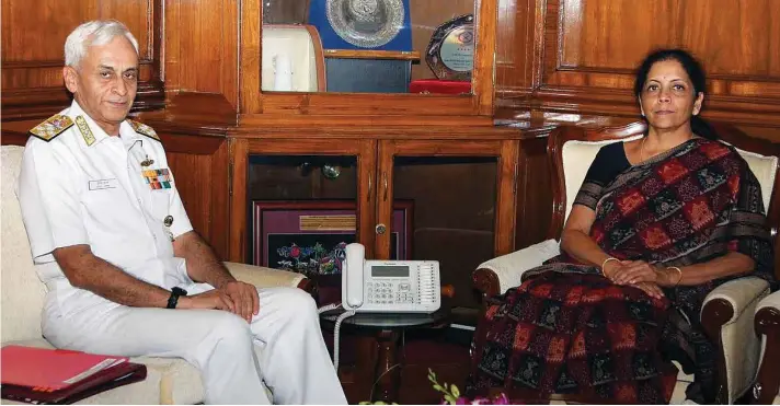  ?? PHOTOGRAPH: @DefenceMin­India ?? Admiral Sunil Lanba, Chief of the Naval Staff and Chairman of the Chiefs of Staff Committee, with Defence Minsiter Nirmala Sitharaman