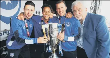  ?? Picture: Joe Pepler ?? Kyle Bennett and Michael Doyle (both centre) join Enda Stevens and Iain McInnes during League Two title-winning celebratio­ns in May 2017.