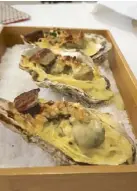  ??  ?? Lolo Dad’s baked oysters with