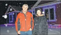  ?? MILLICENT MCKAY/JOURNAL PIONEER ?? Wayne, left, and Barbie Locke outside their home in Indian River. The pair is known for their musical Christmas lights display, which they put up every year.