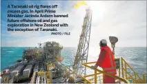  ?? PHOTO / FILE ?? A Taranaki oil rig flares off excess gas. In April Prime Minister Jacinda Ardern banned future offshore oil and gas exploratio­n in New Zealand with the exception of Taranaki.