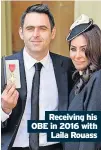  ?? ?? Receiving his OBE in 2016 with Laila Rouass