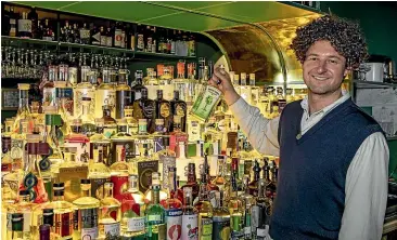  ?? STACY SQUIRES/ STUFF ?? Luke Dawkins, co-owner of Gin Gin in Christchur­ch, has noted a growing interest in New Zealand brands.
