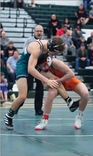  ?? AIMEE BIELOZER — FOR THE MORNING JOURNAL ?? North Olmsted’s Ryan Kennedy and Westlake’s Brogan Hartup wrestle at 120pounds earlier this season.