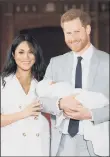  ??  ?? TESTING TIMES: The Duke and Duchess of Sussex, pose with their son Archie just after he was born.