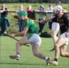  ??  ?? Star performer Aidan Nolan gets away from Seán Barden,