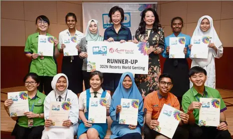  ??  ?? (Standing, third from left) Nadhirah, Goh and Chew posing with the second runners-up of the contest who will be enjoying a trip to Genting Highlands.