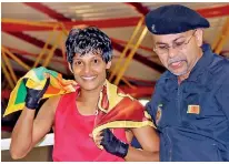  ??  ?? Anusha Kodituwakk­u with Dian Gomes, President, Amateur Boxing Associatio­n of Sri Lanka