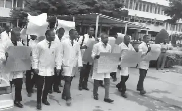  ?? PHOTOS: ?? The ABUTH doctors marching over snake bite Isa Sa’idu