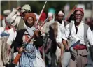  ??  ?? Re-enactors retrace the route of one of the largest slave rebellions in US history. Photograph: Marianna Massey/Getty Images