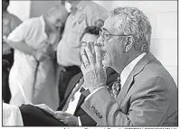  ?? Arkansas Democrat-Gazette/STATON BREIDENTHA­L ?? Psychologi­st Dale Watson told Arkansas Parole Board members Wednesday that Jack Greene suffers psychosoma­tic delusions that make him unable to understand the reality of his punishment. Greene (standing in background) interrupte­d Watson and his own...