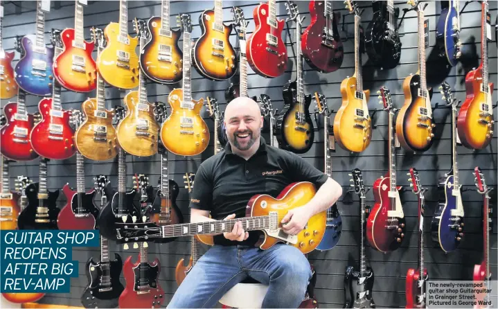  ??  ?? The newly-revamped guitar shop Guitarguit­ar in Grainger Street. Pictured is George Ward