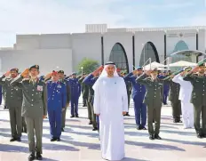  ?? WAM ?? Lt. General Hamad Mohammad Thani Al Rumaithi, Chief of Staff of the UAE Armed Forces, leads tributes to martyrs at the Ministry of Defence.