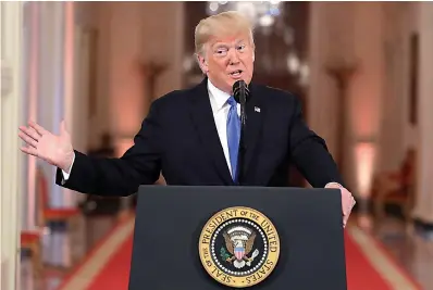  ?? AP Photo/Evan Vucci ?? ■ President Donald Trump speaks during a news conference Wednesday in the East Room of the White House in Washington.