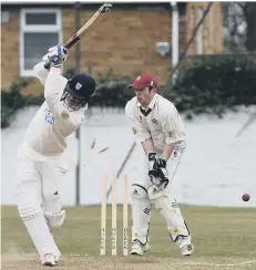  ??  ?? Benwell Hill batsman Adam Hickey is bowled by Eppleton’s David Wilkinson, with Gary Burlinson keeping. Picture by Kevin Brady