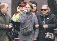  ??  ?? Family members of air crash victims stand at Barcelona’s El Prat airport after a Germanwing­s airliner crashed near a ski resort in the French Alps with all 150 people on board feared dead, officials said. — AFP photo