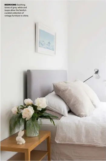  ??  ?? BEDROOMS Soothing tones of grey, white and taupe allow the family’s curated collection of vintage furniture to shine.