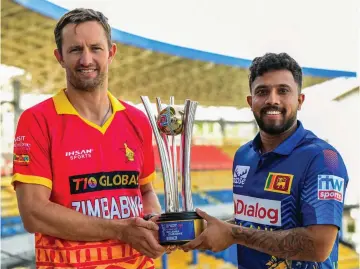  ?? ?? The ODI series trophy for the Zimbabwe tour of Sri Lanka was unveiled by the two captains – Craig Ervine (left) and Kusal Mendis yesterday
