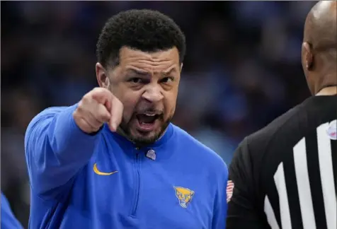  ?? Susan Walsh/Associated Press ?? Pittsburgh head coach Jeff Capel and the Panthers didn’t have a strong non-conference strength of schedule. Pitt’s worst loss of the season was undoubtedl­y against Missouri, which has a NET ranking of 158.