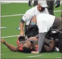  ?? Ap-michael Ainsworth ?? Cleveland Browns running back Nick Chubb receives assistance from team staff after suffering an unknown injury in the first half of an NFL football game against the Dallas Cowboys.
