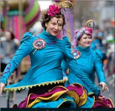  ?? ?? LIMERICK Performers add a splash of non-green colour to the Treaty City’s big day