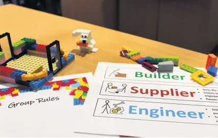  ??  ?? > Lego-based therapy is helping people with autism