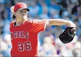  ?? Chris Carlson
Associated Press ?? JERED WEAVER DOESN’T feel great and hasn’t pitched in a week, but the former ace said of Manager Mike Scioscia, “If he gives me the ball, I’ll pitch.”