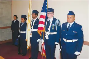  ?? Photo by Joseph B. Nadeau ?? From left, members of the Woonsocket High School Air Force Jr. ROTC honor guard are Cadets Luisa Perez-Herrera, Natasha Rodriguez, Esdras Guerre, staff sergeant, Bradley Beaver, 1st Lieutenant, and Rafeal Hagler, staff sergeant.