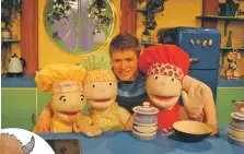  ??  ?? Puppets and CBBC presenter Derek Mackintosh; and left, Meaban and Moo.