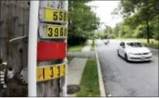  ?? JULIO CORTEZ — THE ASSOCIATED PRESS ?? In this Saturday photo, polyvinyl chloride piping is seen on an utility pole as a vehicle drives by on Airmount Road in Mahwah, N.J.