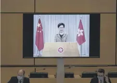  ??  ?? 0 Hong Kong’s chief executive Carrie Lam defends the new law