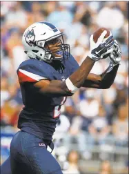  ?? Associated Press file photo ?? UConn wide receiver Tyraiq Beals, above, and sophomore Keyion Dixon have split time with the starters at almost every practice.