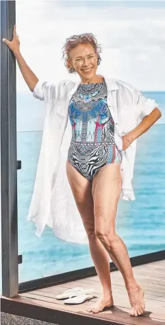  ?? Picture: DAVE BLAKE ?? NEW-FOUND LOVE: Cairns cancer survivor Helen Bairstow hit the runway for the first time as Swimwear Galore's most mature face and body of summer.