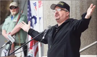  ?? Jared Ramsdell / Journal Inquirer via Associated Press ?? Stewart Rhodes, founder of the Oath Keepers, speaks during a gun rights rally at the State Capitol in Hartford on April 20, 2013. Rhodes has been arrested and charged with seditious conspiracy in the Jan. 6 attack on the U.S. Capitol. The Justice Department announced the charges against Rhodes on Thursday.