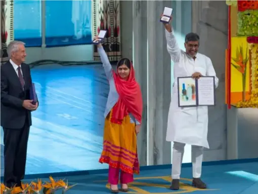  ?? (Getty) ?? Malala Yousafzai (left) and Kailash Satyarthi accept their Nobel Peace Prize in 2014