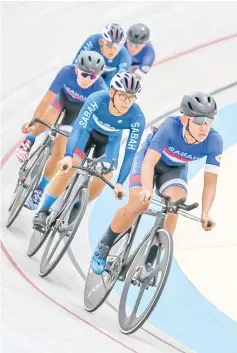  ??  ?? Sabah's track riders in action in the team pursuit race against Perak at the Velodrome Rakyat in Ipoh.