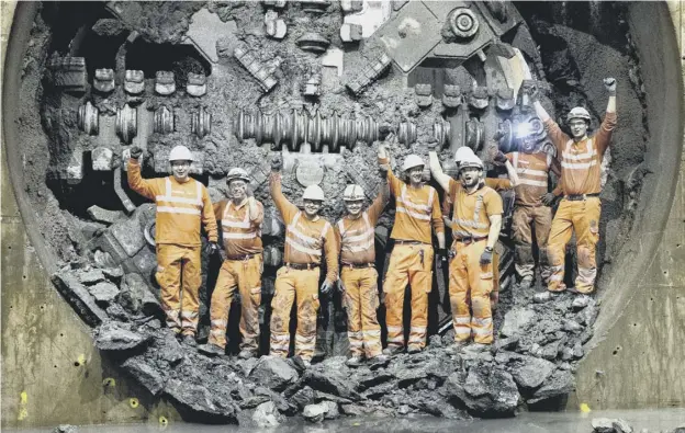  ??  ?? 0 Not at all boring: The massive machine and its crew helped to dig the three-mile tunnel under the southside of Glasgow