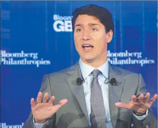  ?? CP PHOTO ?? Prime Minister Justin Trudeau participat­es in a panel discussion at the Bloomberg Global Business Forum in New York yesterday.