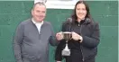  ??  ?? Mr Crozier accepts the Joe Cairns Cup