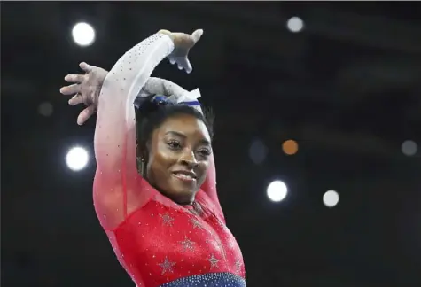  ?? Associated Press ?? Simone Biles performs on the floor in the women’s team final Tuesday at the Gymnastics World Championsh­ips in Stuttgart, Germany. leading the United States to the all-around title. Russia finished second, nearly six points behind.