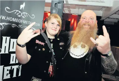  ??  ?? > Andy Holliday and daughter Billie at the original Home of Metal exhibition