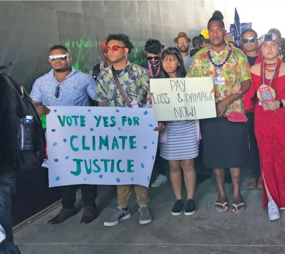  ?? WE ARE NOT DROWNING, WE ARE FIGHTING… Photo: Inoke Rabonu ?? Pacific Island Youths joined youths from around the world during a protest March demanding climate justice at the COP27 venue in Sharm El-Shiekh, Egypt on November 13, 2022.