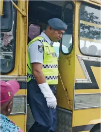  ?? Photo: Ronald Kumar ?? Police Constable Timoci Dakuna was spotted on April 17, 2023, ensuring the safety of students boarding a bus outside the HFC Bank Stadium in Suva.