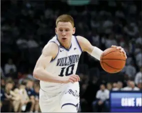  ?? LAURENCE KESTERSON — THE ASSOCIATED PRESS FILE ?? In this file photo, Villanova guard Donte DiVincenzo (10) dribbles during an NCAA college basketball game against Butler, in Philadelph­ia. DiVincenzo was the surprise star of the NCAA championsh­ip game for Villanova, then became a surprise NBA draft entrant.