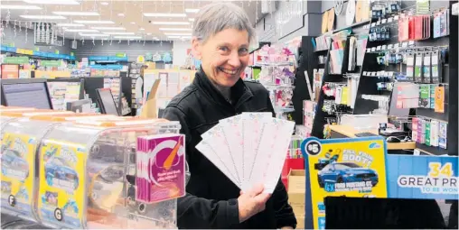  ?? Photo / Ilona Hanne ?? Paper Plus Stratford owneropera­tor Margie Hodgetts is all smiles with the news a lucky Lotto ticket was sold from her store.