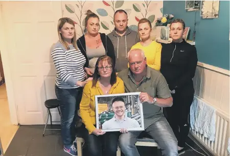  ??  ?? Alex Slark’s mum and dad Brenda and Alex with his sisters and brother, from left, Stacey Bone, Stephanie McIntyre, Jason Veitch, Shelly Waddle and Sharon Rowe.