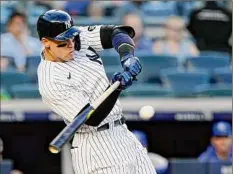  ?? Kathy Willens / Associated Press ?? New York’s Aaron Judge swings at a pitch against Kansas City on Wednesday. He was 0-for-5 in the game.